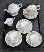 A tray of Minton Haddon Hall tea cups and saucers, small teapot,