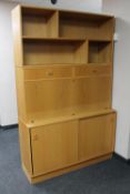 A 20th century Danish teak triple section bookcase