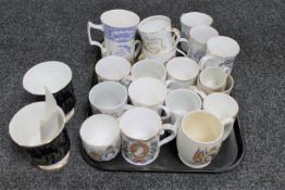 A tray of commemorative china mugs, tea cups, gilded china,