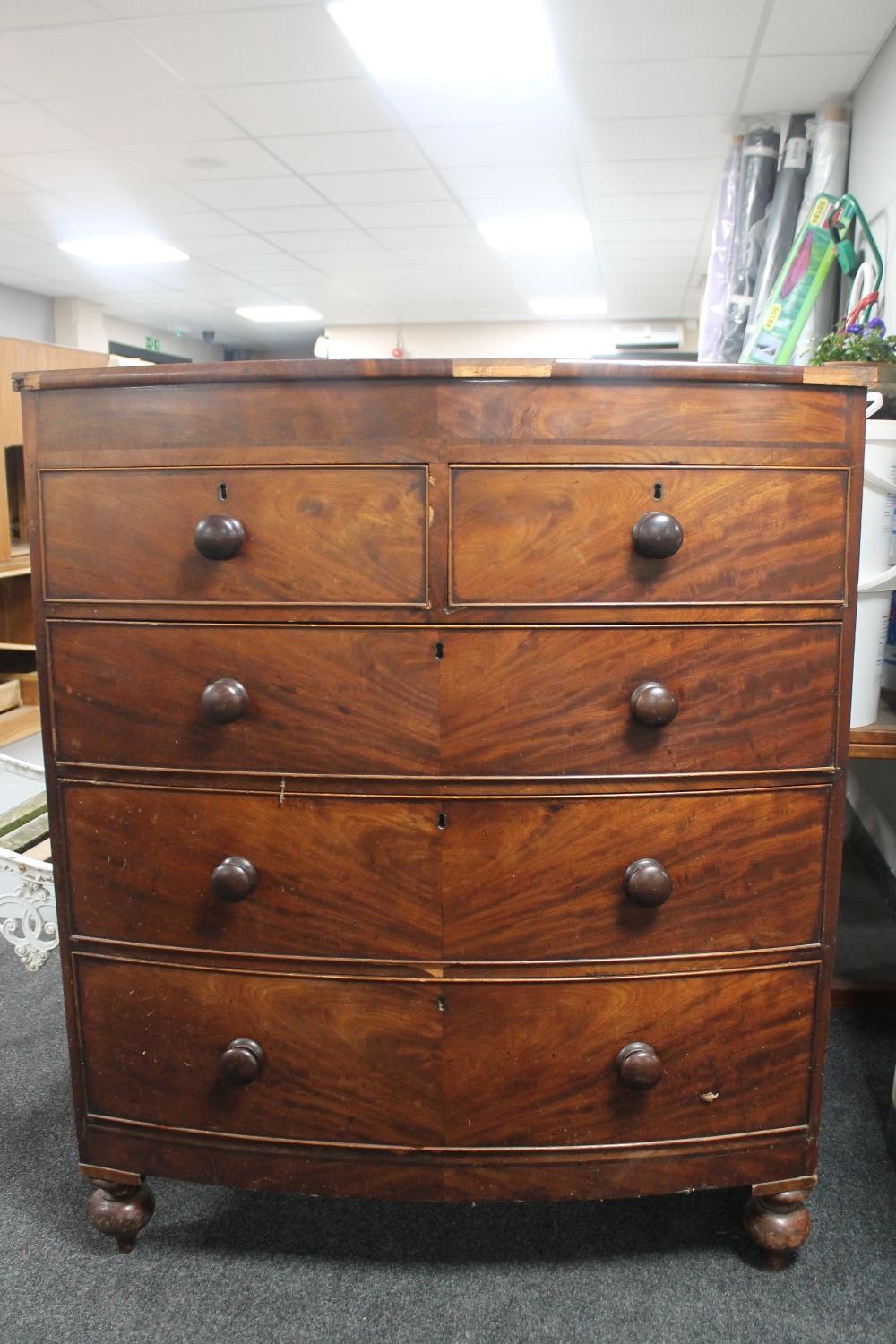 A Victorian mahogany bow fronted five drawer chest (a/f)