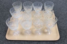 A set of twelve cut crystal wine glasses