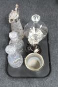 A tray of crystal decanters, silver Scotch label, ship's decanter,