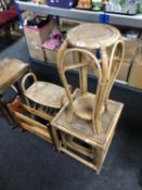 A nest of three bamboo and wicker tables,