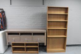 Two entertainment stands and a set of open bookshelves