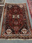 An antique Kashgai rug 117 cm x 175 cm