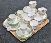 A tray of bone china tea service and a part Stanley tea service