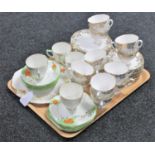 A tray of bone china tea service and a part Stanley tea service