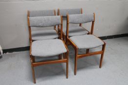 A set of four mid century Danish teak dining chairs