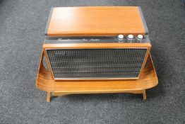 A Hacker Grenadier stereo amplifier together with a folding bed tray