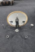 A contemporary metal nine branch candle holder together with an oval gilt framed mirror