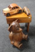 A wooden cracket, wooden motor car,