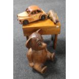 A wooden cracket, wooden motor car,