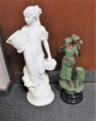 A painted chalk figure - female with basket together with a further painted composite figure -