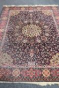 A Tabriz design rug on blue ground,