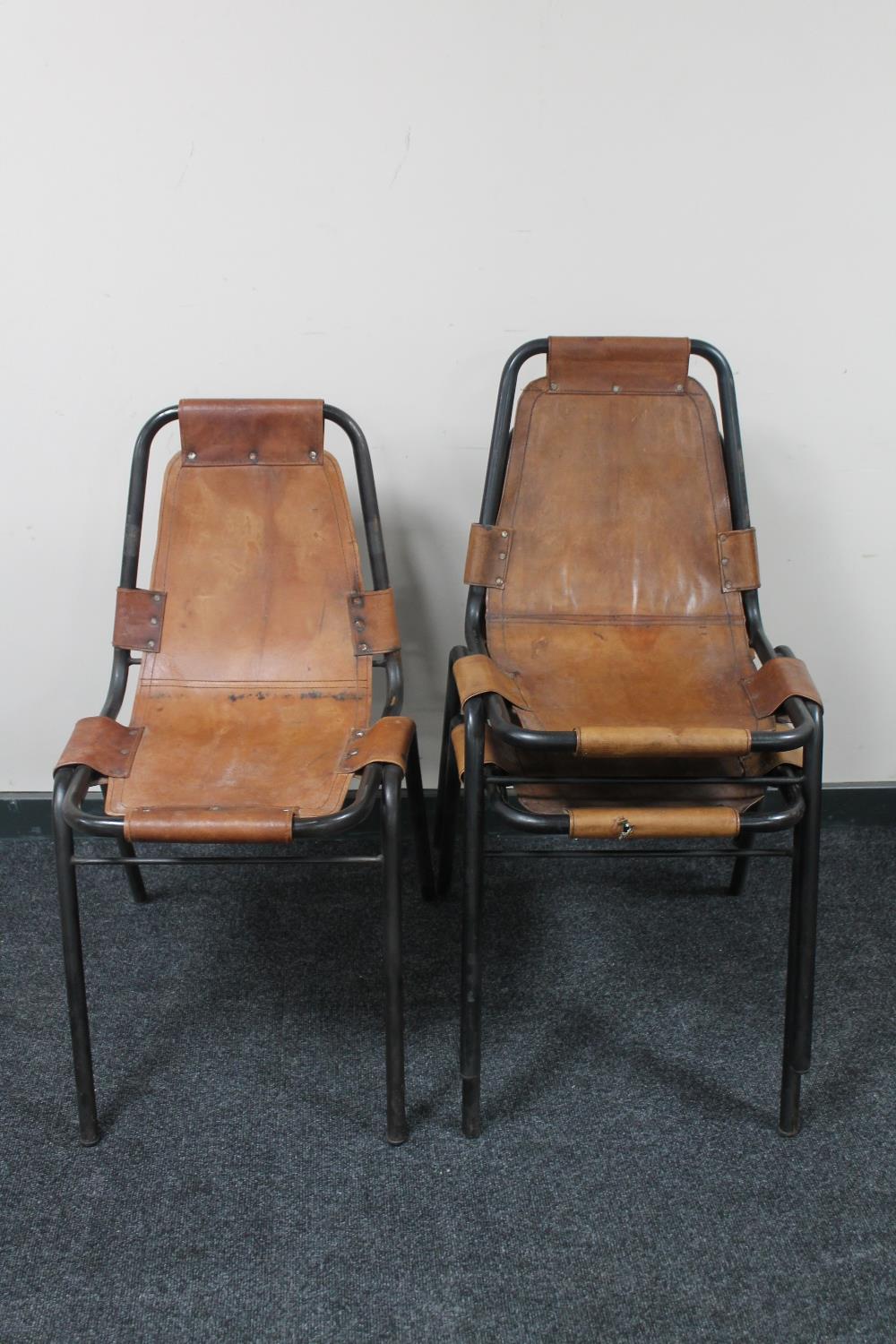 A set of three 20th century metal framed stacking chairs after Charlotte Perriand 'Les Arcs',