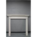 A 19th century painted pine fire surround