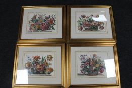 A set of four gilt framed colour prints of flowers