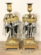 A pair of Regency gilt brass and bronze mounted eagle lustre's