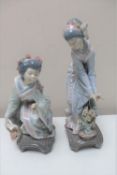 Two Lladro figures of Geishas with flowers and a bonsai tree