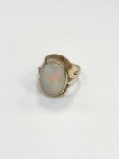 A 9ct gold opal ring, size O CONDITION REPORT: 4.