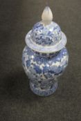 A 20th century Chinese blue and white lidded urn, height 73 cm, with blue character mark to base.