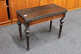A 19th century turnover top tea table