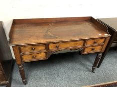 A William IV mahogany desk fitted with five drawers,
