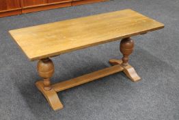 An oak refectory coffee table