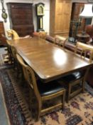A good quality twin pedestal extending dining table, 231cm extended,