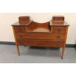 A Victorian inlaid mahogany sunk centre dressing table (no mirror)