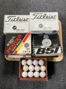 A tray of fourteen vintage boxed sets of golf balls - Top Flight, Dunlop,