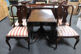 An inlaid mahogany drop leaf table and four dining chairs