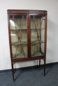 A late Victorian mahogany display cabinet