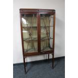 A late Victorian mahogany display cabinet