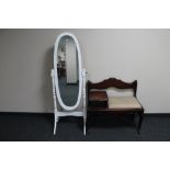A painted cheval mirror and a telephone table