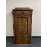 An antique mahogany sentry door cabinet (a/f)