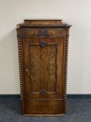 An antique mahogany sentry door cabinet (a/f)