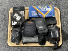 A tray of assorted cameras and accessories to include Olympus OM10, Fujifilm digital camera,