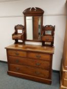 A Victorian mahogany four drawer dressing table, width 120 cm.