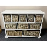 A contemporary unit fitted with ten wicker baskets