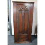 An oak Arts & Crafts hall wardrobe