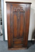 An oak Arts & Crafts hall wardrobe