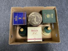 A box of six Bells Whiskey decanters (empty)