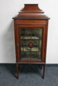 An Edwardian inlaid mahogany display cabinet