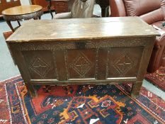 A George III panelled oak coffer,