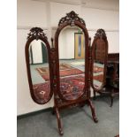 A reproduction mahogany cheval triple mirror, height 181 cm.