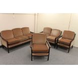 A 20th century Danish four piece lounge suite in brown dralon