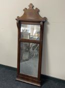 A late 19th century inlaid mahogany hall mirror