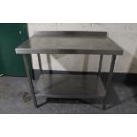 A stainless steel two tier prep table