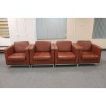 Four contemporary brown leather look armchairs